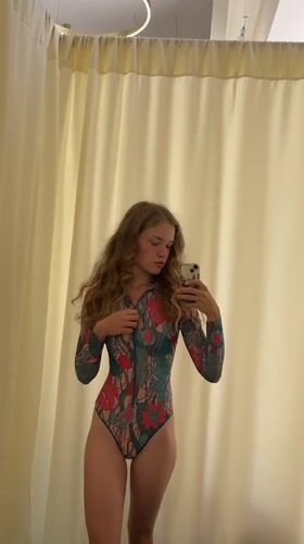 Woman takes fitting room selfies in Montenegro coastal town