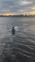 Jet skis on the Volga River, Astrakhan, summer evening.