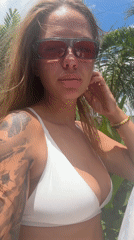 Woman photographed in tropical setting in North Kuta, Indonesia