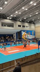 Volleyball match underway at indoor arena in Burgas, Bulgaria