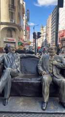Laughing men sculpture spotted on Buenos Aires street corner