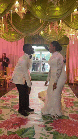 Wedding celebration dancing captured in decorated Abuja venue