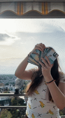Woman reads tarot cards on balcony in Waiblingen