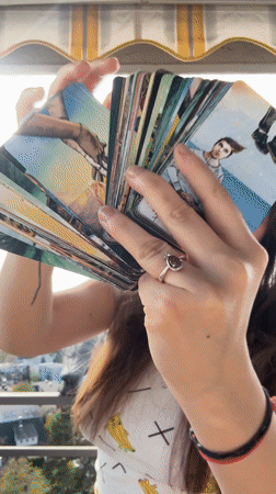 Woman reads tarot cards on balcony in Waiblingen