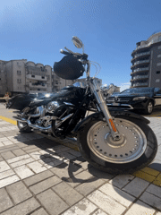 Motorcycle parked as customer visits cafe in Montenegro village