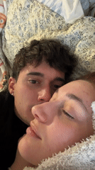 Intimate couple moment captured in Sofia bedroom