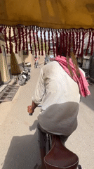 Early morning street commerce documented in Varanasi