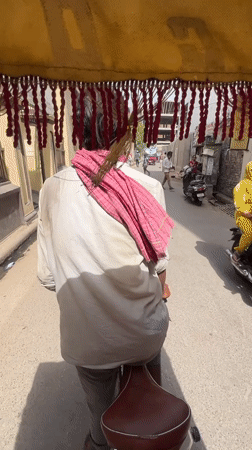 Early morning street commerce documented in Varanasi
