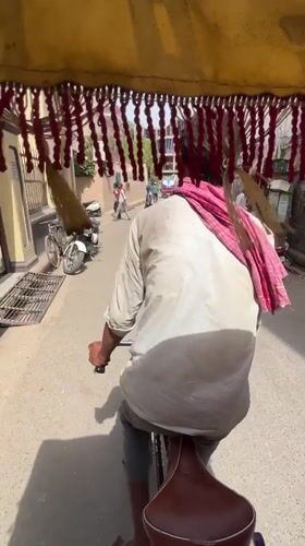Early morning street commerce documented in Varanasi