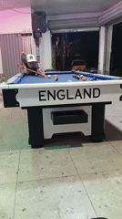 Man plays pool at indoor establishment in Jamundí, Colombia