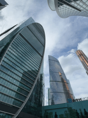 Modern skyscrapers photographed in Khimki under cloudy skies