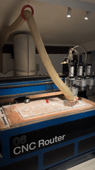 CNC router cuts composite material in North Kuta workshop