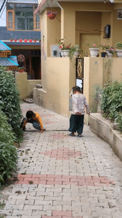 Daily life moments captured across Naddi village, India