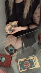 Quiet afternoon moments with tarot cards and playful pug