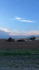Rural farming and road activity observed in Перевозное
