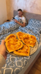 Woman makes heart-shaped pizzas for Valentine's Day in Montenegro