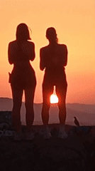 Sunset watch over Barcelona from a graffiti-tagged hilltop viewpoint