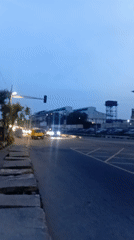 Evening street crossing captured in busy Ikeja district