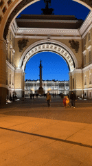 Street musicians perform at Palace Square during St. Petersburg twilight