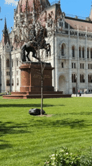 Robotic lawnmower operates at government building in Budapest