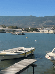 Morning coffee and coastal views in Poros, Greece