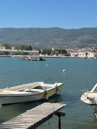 Morning coffee and coastal views in Poros, Greece