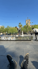 BMX rider performs ledge trick in Barcelona