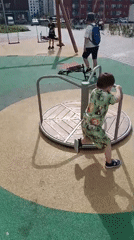 Children play at Yekaterinburg playground during morning hours