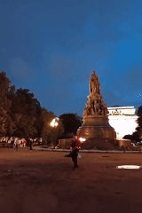 Fire performers, horses, and dusk streets along Nevsky Prospekt