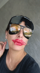 Woman poses with multiple eyewear pieces in Andreyevo selfies