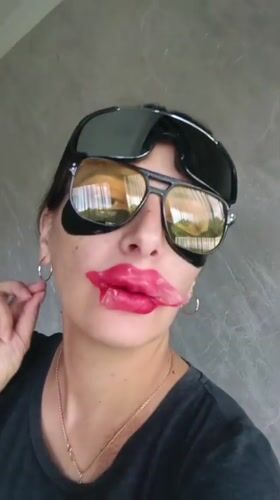 Woman poses with multiple eyewear pieces in Andreyevo selfies