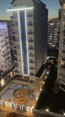 Evening documented: urban sunset time-lapse, indoor cat moments