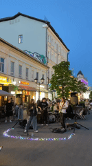 Street musicians and breakdancers perform for crowds in Kazan