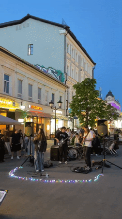 Street musicians and breakdancers perform for crowds in Kazan