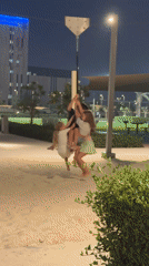 Nighttime park gathering captured in Dubai playground scenes