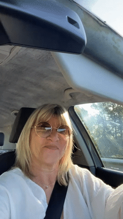 Sunny thumbs-up from behind the wheel in Loire, France