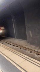 TMB train 401 arrives at Barcelona subway station