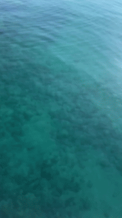 Crystal clear waters documented from ferry near Thassos, Greece