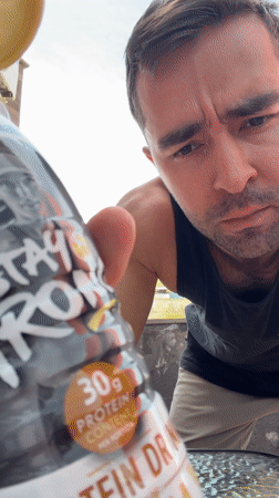 Man photographed looking skyward in Tbilisi residential area