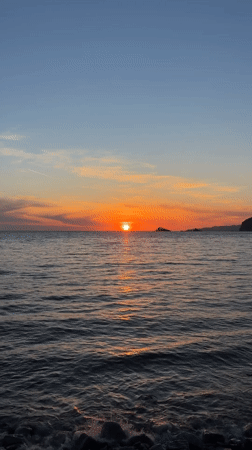 Sunset captured over ocean waters near Buljarica, Montenegro