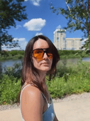 Strolling a Tyumen park path on a sunny June morning