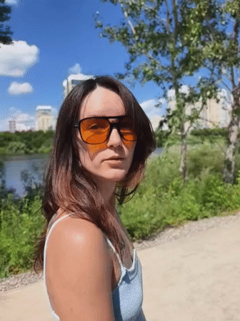 Strolling a Tyumen park path on a sunny June morning
