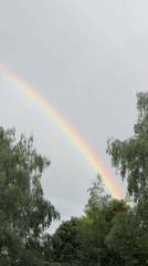 Rainbow appears over Pernik, Bulgaria during afternoon storm