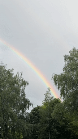 Rainbow appears over Pernik, Bulgaria during afternoon storm