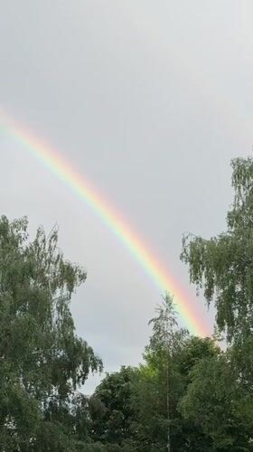 Rainbow appears over Pernik, Bulgaria during afternoon storm