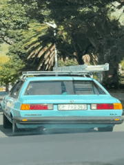 Vintage Blue Volkswagen Drives Cape Town Street Near Table Mountain