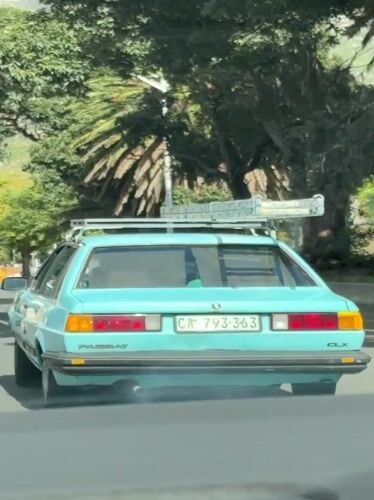 Vintage Blue Volkswagen Drives Cape Town Street Near Table Mountain