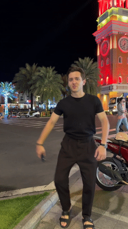 Nighttime food stalls and illuminated landmarks captured in Phú Quốc