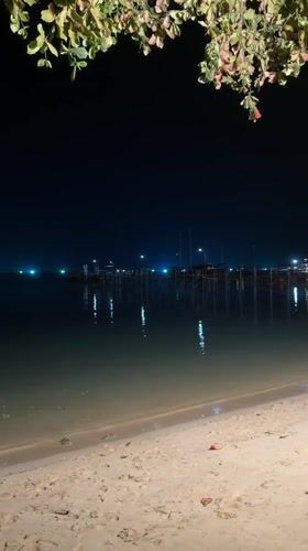 Evening dining captured at beachside restaurant in Thailand