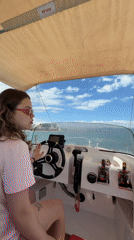 Couple enjoys sunny morning boat ride off Torremolinos coast